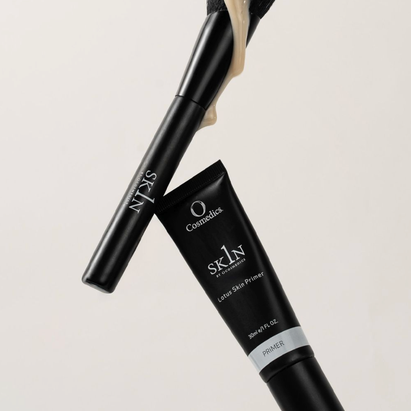 O Cosmedics 1Skin Lotus Primer with applicator on a light gray background