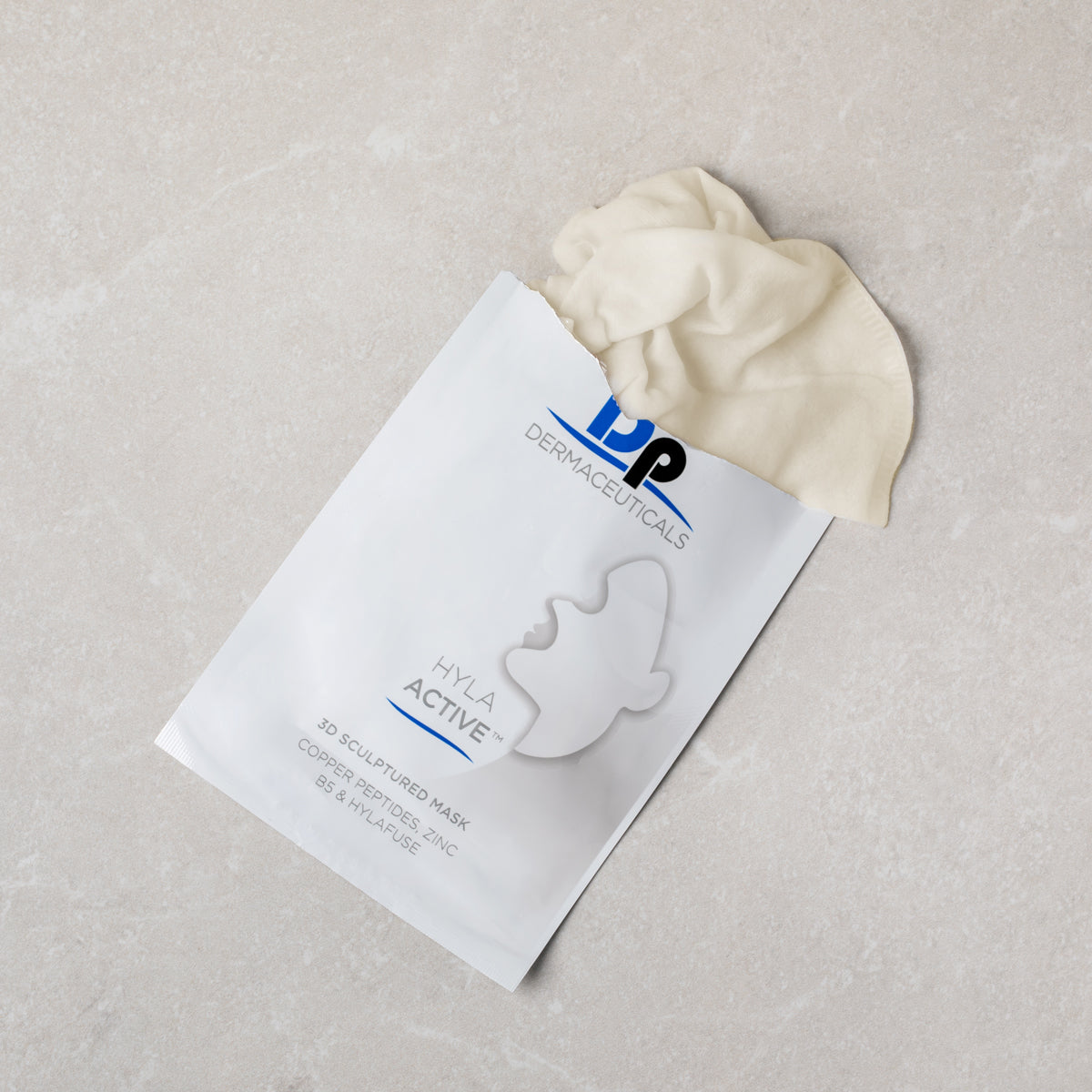 Dermaceuticals Hyla Active mask packaging on a textured surface