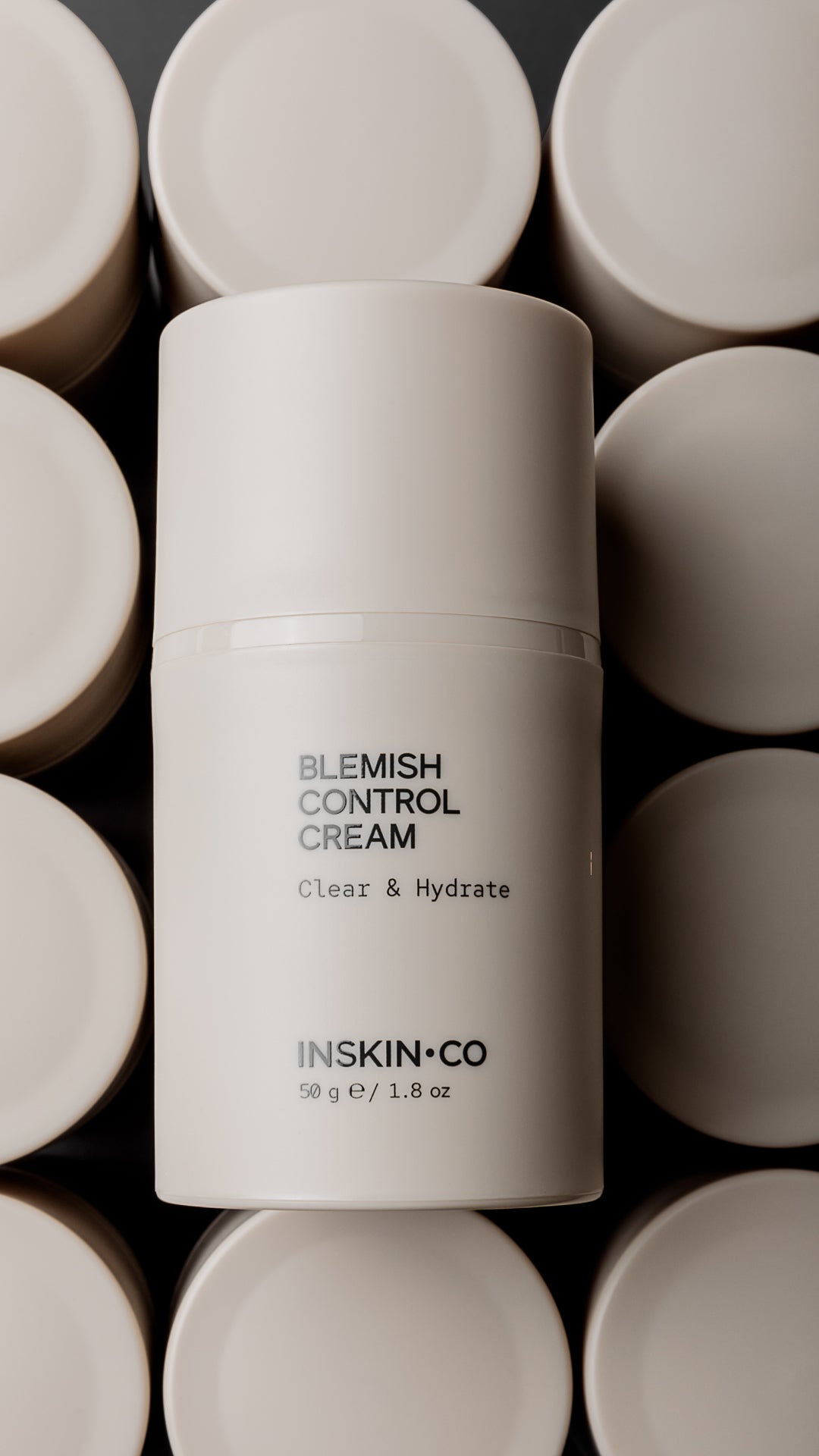 Blemish Control Cream container with 'INSKIN CO' branding on a dark background