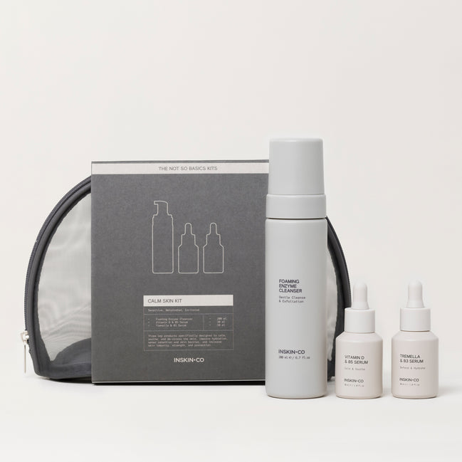 INSKIN.CO Calm Skin Kit with bottles and a pouch on a light gray background