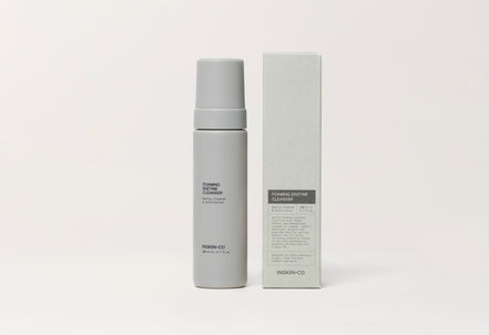Foaming Enzyme Cleanser and packaging on a white background