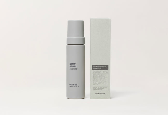 Foaming Enzyme Cleanser and packaging on a white background