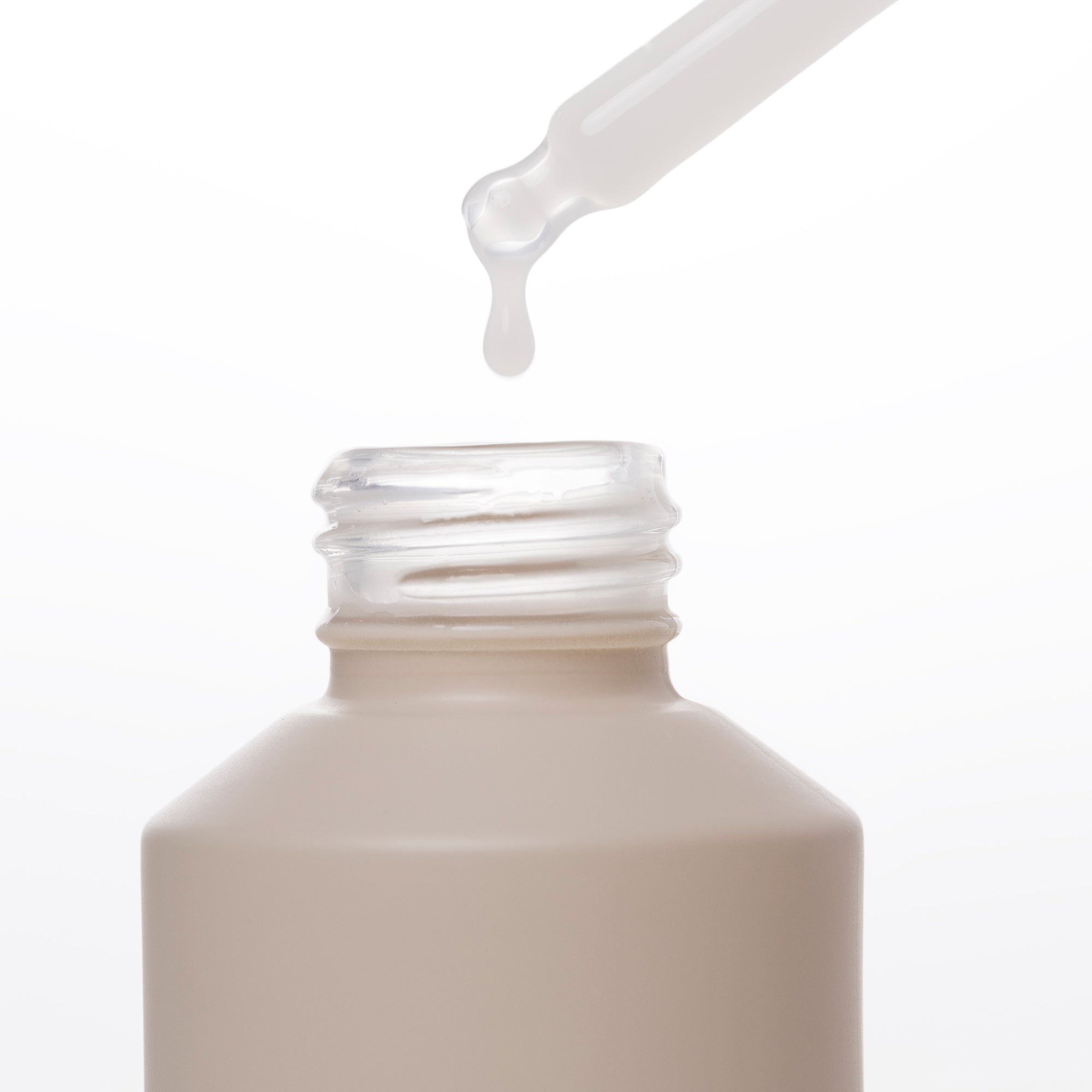Close-up of Liquid Hydrator bottle with a dropper on a white background