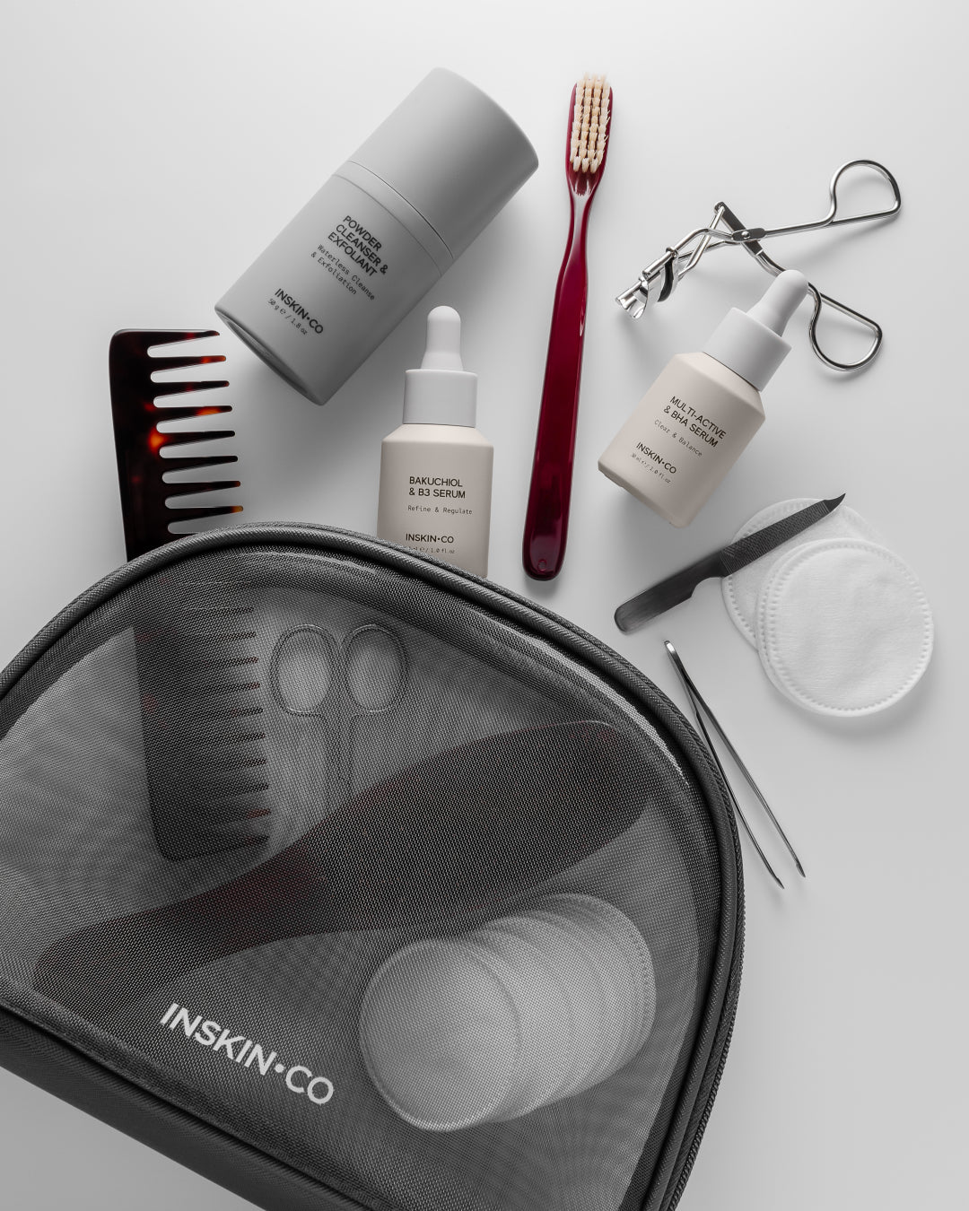 Collection of skincare and grooming products with INSKIN+CO Renew Skin Kit on a white background.