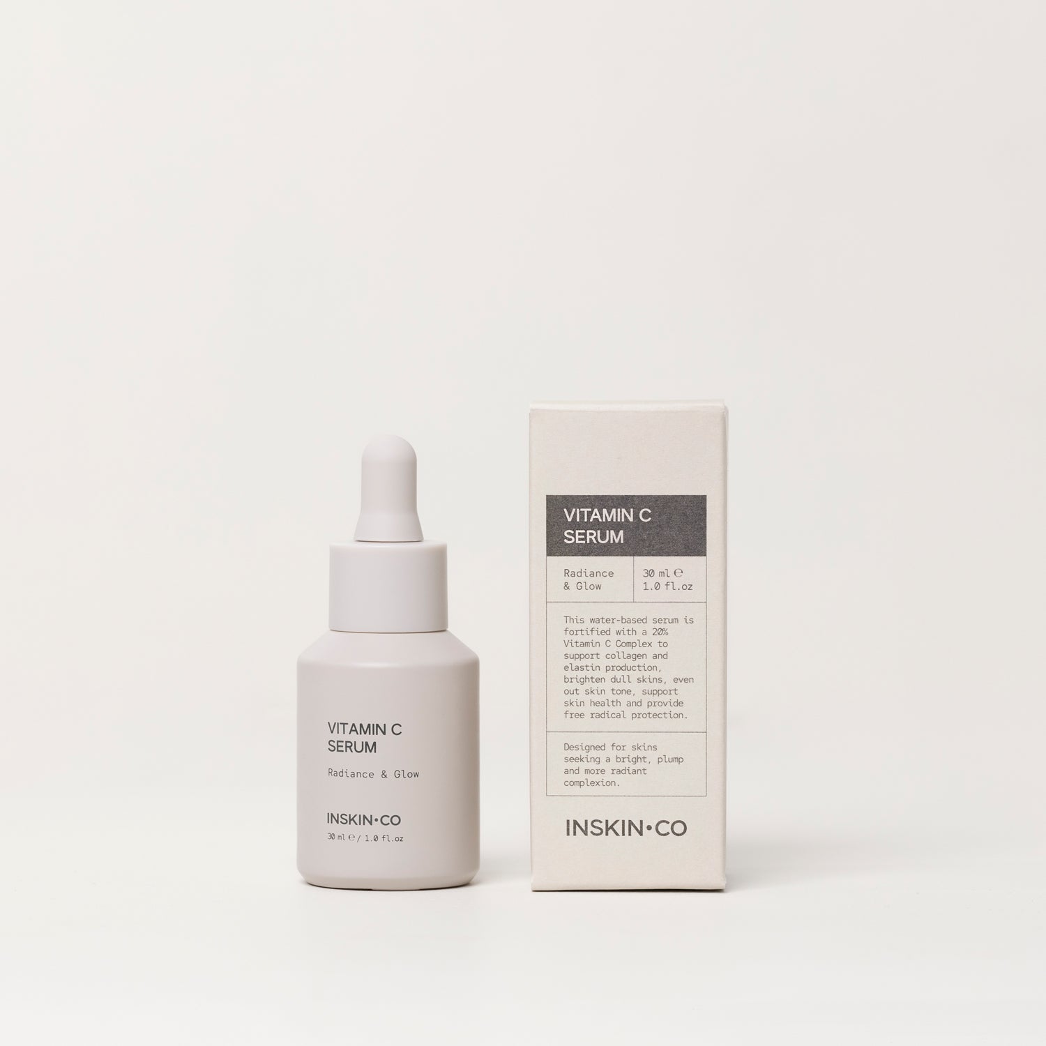 Vitamin C serum bottle and packaging on a white background