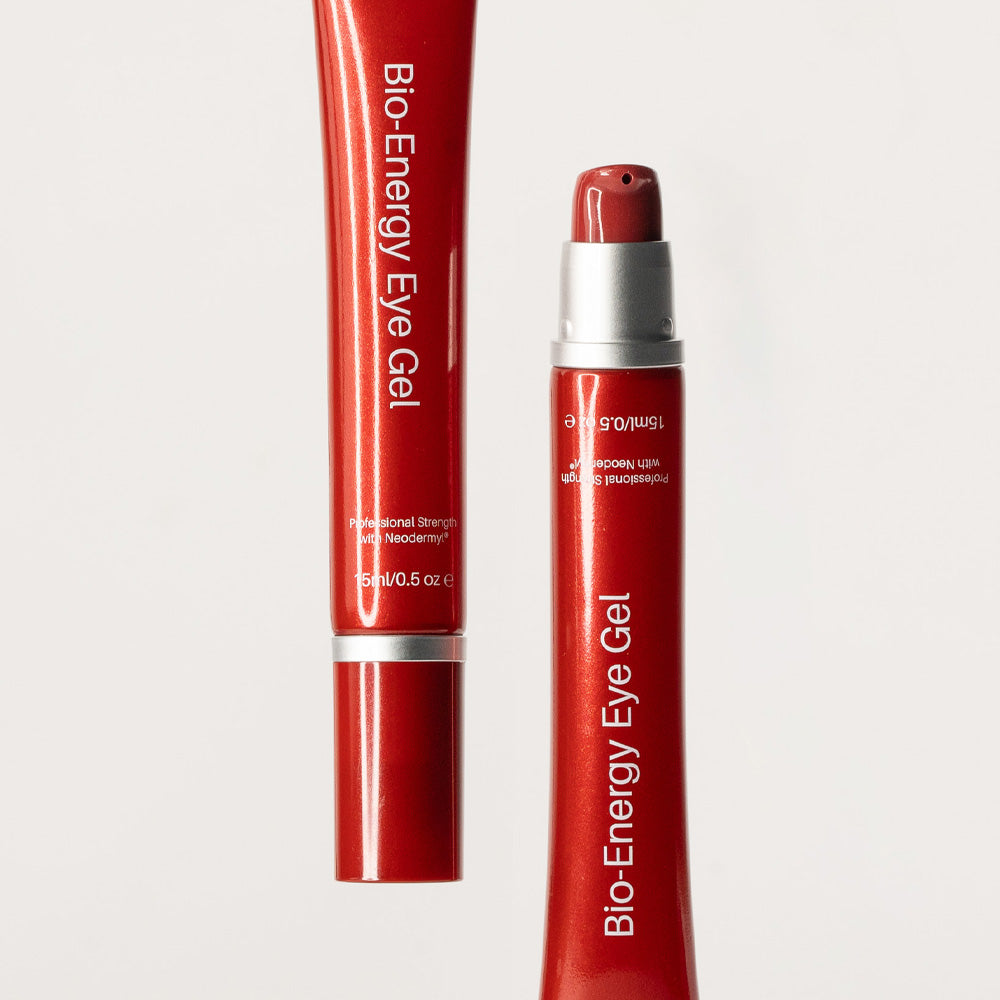 Two red tubes of O Cosmedics Bio-Energy Eye Gel on a white background