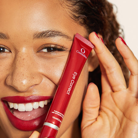 Woman holding 'O' Eye Correct close to her face.