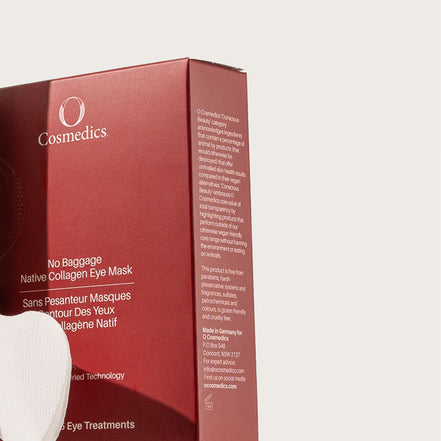 Red box of O Cosmedics 'No Baggage Native Collagen Eye Masks on a light grey background