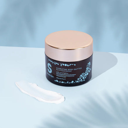 Sunscape Hydrating Body Butter on a light blue background
